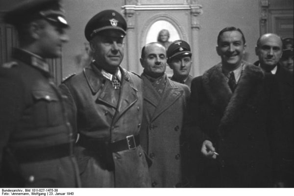 Marseille, 23 January 1943. René Bousquet is second from right. Photo by Wolfgang Vennemann (1943) and courtesy of Bundesarchiv, Bild 1011-027-1475-38. PD-CC-BY-SA 3.0. Wikimedia Commons