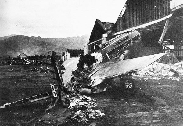A destroyed Curtiss P-40 at Wheeler Field, Oahu, 1941. Photo by anonymous (December 1941). PD-USGOV. Wikimedia Commons. 