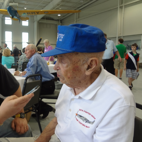 Interviewing living legend, Bill Overstreet at Warbirds Over the Beach. Photo by anonymous (2013). Courtesy of Warbirds News. 