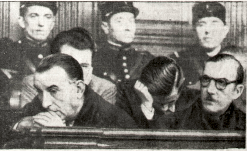 Pierre Bonny (on the right) and Henri Lafont (on the left) during their trial in the Cour de justice de la Seine, on 11 December 1944. Photo by anonymour (11 December 1944). Members of the French Gestapo. Libération. PD-Expired Copyright. Wikimedia Commons.