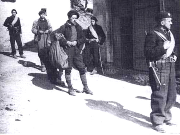 Arrest of maquisards by the French Milice (the French Gestapo). Photo by anonymous Milicien (22 February 1944). PD-70+ Wikimedia Commons.