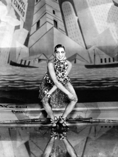 Josephine Baker dancing the Charleston at the Folies-Bergère, Paris. Photo by Lucien Waléry (c. 1926). PD-70+. Wikimedia Commons. 