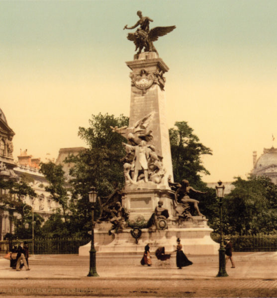 The Gambetta Monument originally located in the Carousel du Louvre. Notice the building on the left. This is the Richelieu Pavilion of the Louvre. The trees in the background have been replaced by the I.M. Pei Pyramid. Photo by anonymous (c. 1900). Author’s collection.