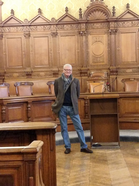 Mark standing in the courtroom in the French Palace of Justice where Marie Antoinette and the Girondins were tried. Photo by Jennifer Zane Vaughan (2015).