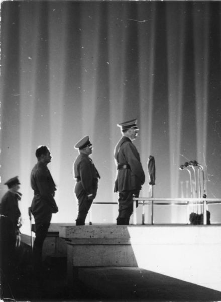 Nürnberg Reichsparteitag, Adolf Hitler vor Lichtdom (Nuremberg Congress Party, Adolf Hitler in front of the lights). Photo by anonymous (11 September 1936). German Federal Archives. Bundesarchive, Bild 183-2006-0329-502/CC-BY-SA 3.0. Wikimedia Commons. 