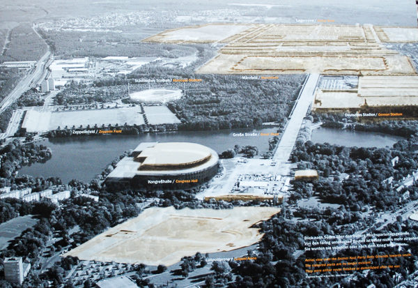 Aerial photo of the Party Rally Grounds. Zeppelin Field is in the foreground. Photo by anonymous (date unknown). Documentation Center. Photo by Sandy Ross (2017). 