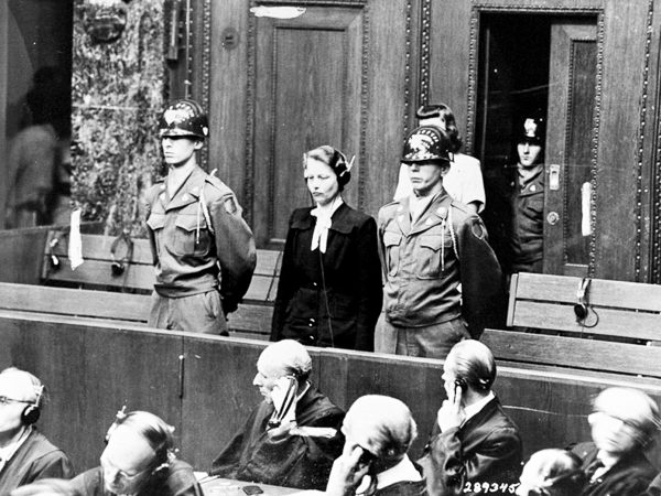 Defendant Herta Oberheuser stands to receive her sentencing at the Doctors’ Trial (Case 1), Nuremberg 1947. Photo by US Army (20 August 1947). National Archives and Records Administration. PD-US Government. Wikimedia Commons. 