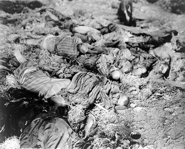 Dead workers found by American 3rd Armored Division when it captured the German slave labor camp. Photo by U.S. Army (11 April 1945). PD-US Government. Wikimedia Commons.
