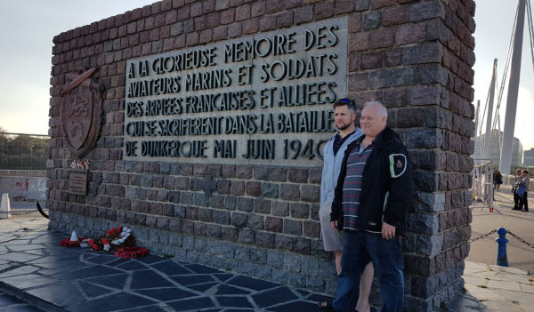 Denis Caron (left) and his father next to Dunkirk monument. Photo by Janet O’Rourke (November 2017).