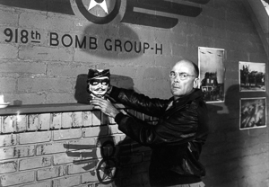 In the officer’s club of the 918th Bomb Group (H), group adjutant Major Stovall (Dean Jagger), alerts 918th officers of a bombing mission by turning the group’s Toby Mug to face the room. Photo by Twentieth Century Fox Film Corp. (1949). Author’s collection. 