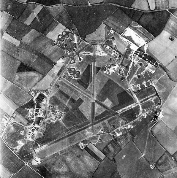 Aerial photograph of RAF Chelveston airfield, oriented north, 9 May 1944. Photo by 13th Photographic Squadron (9 May 1944). PD-USGOV. Wikimedia Commons. 