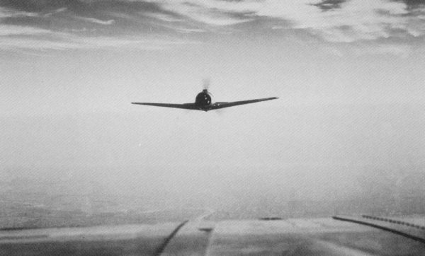 Head on attack of a B-17 by a Focke-Wulf Fw 109 before it banked to the right or left. Photo by anonymous (date unknown). PD-USGOV. Wikimedia Commons. 