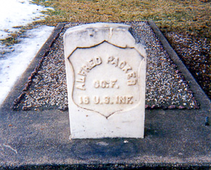 Alfred Packer’s tombstone. Notice the chunk missing in the upper right corner? Photo by Tom Peepgrass (date unknown). Find a Grave. www.findagrave.com 