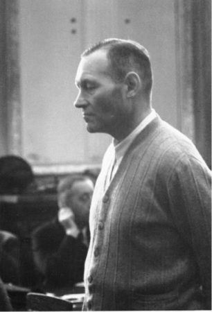 Generaloberst Erich Hoepner standing before Judge Roland Freisler at The People’s Court. Photo by anonymous (1944). German Federal Archives. PD-Bundesarchiv, Bild 151-25-07/CC-BY-SA 3.0. Wikimedia Commons. 
