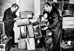 Detectives examining some of the forty-eight suit cases sold by the doctor to a receiver—the property of his unfortunate victims. Photo by anonymous (c. 1946). The Illustrated London News, 20 April 1946. Author’s collection. 
