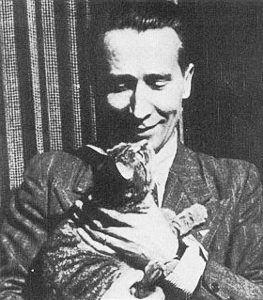 ARMAND holding a cat. Photo by anonymous (date unknown). 