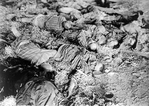 Dead workers lie on the floors of Nordhausen/Mittelwerks. Photo by U.S. Army Signal Corps (April 1945). U.S. Library of Congress. PD-U.S. Government. Wikimedia Commons. 