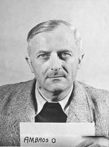 Otto Ambros, I.G. Farben official and manager of Farben’s manufacturing facility at Auschwitz. Soon to be put on trial for crimes against humanity. Photo by U.S. Army (c. 1945-49). PD-U.S. Government. Wikimedia Commons. 