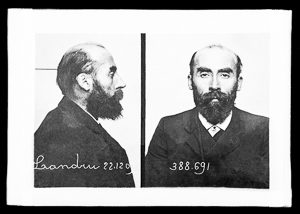 Police mugshot of Henri Désiré Landru, French serial killer. Photo by anonymous (c. 1909). Préfecture de Police. PD-100+. Wikimedia Commons. 