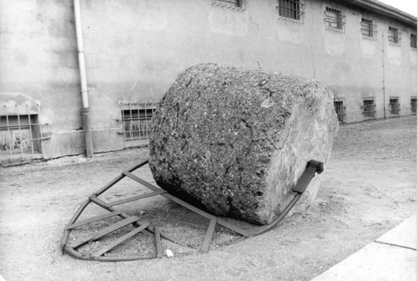 Heavy roller pulled by inmates of Ravensbrück and used for road construction. Photo by Benno Bartocha (1985). Bundesarchiv, Bild 183-1985-1105-310/CC-BY-SA 3.0. PD-CCA-Share Alike 3.0 Germany. Wikimedia Commons.
