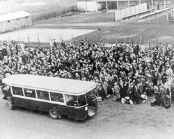 Arrested detainees and bus at Drancy internment camp. Photo by anonymous (c. 1942).