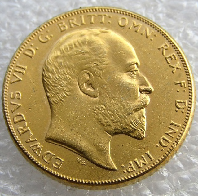1908 British coin with King Edward VII (son of Queen Victoria) facing right. Photo by anonymous (date unknown).