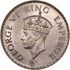British coin with King George VI (younger son of King George V) facing left. Photo by anonymous (date unknown).