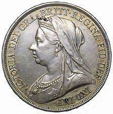 British coin with Queen Victoria (Great-great-great grandmother of Elizabeth II) facing left. Photo by anonymous (date unknown).