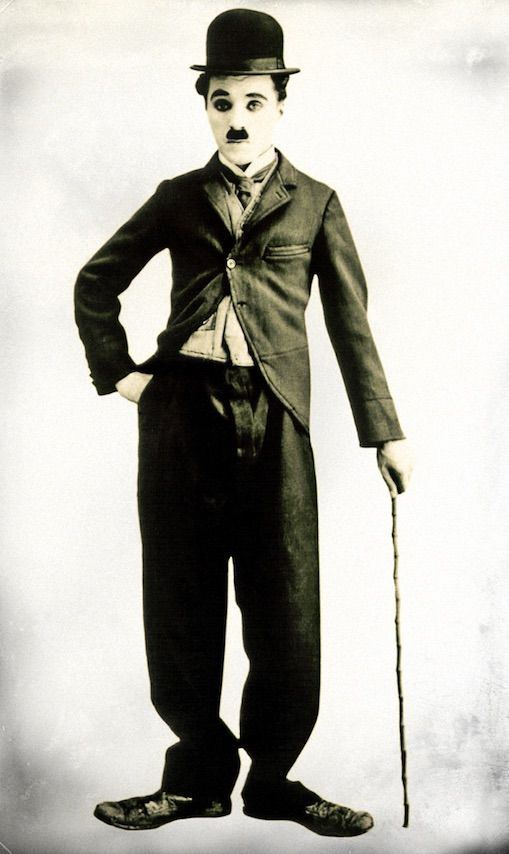 Charlie Chaplin in the tramp role that made him famous. Photo by anonymous (date unknown).