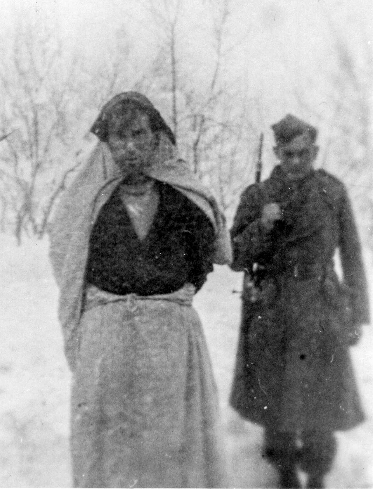 Ustaše militia man captured while wearing women’s clothes. Yugoslav partisans captured him while trying to hide. Photo by anonymous (c. 1944-45). PD-Pursuant to Yugoslav Copyright Act of 1978. Wikimedia Commons