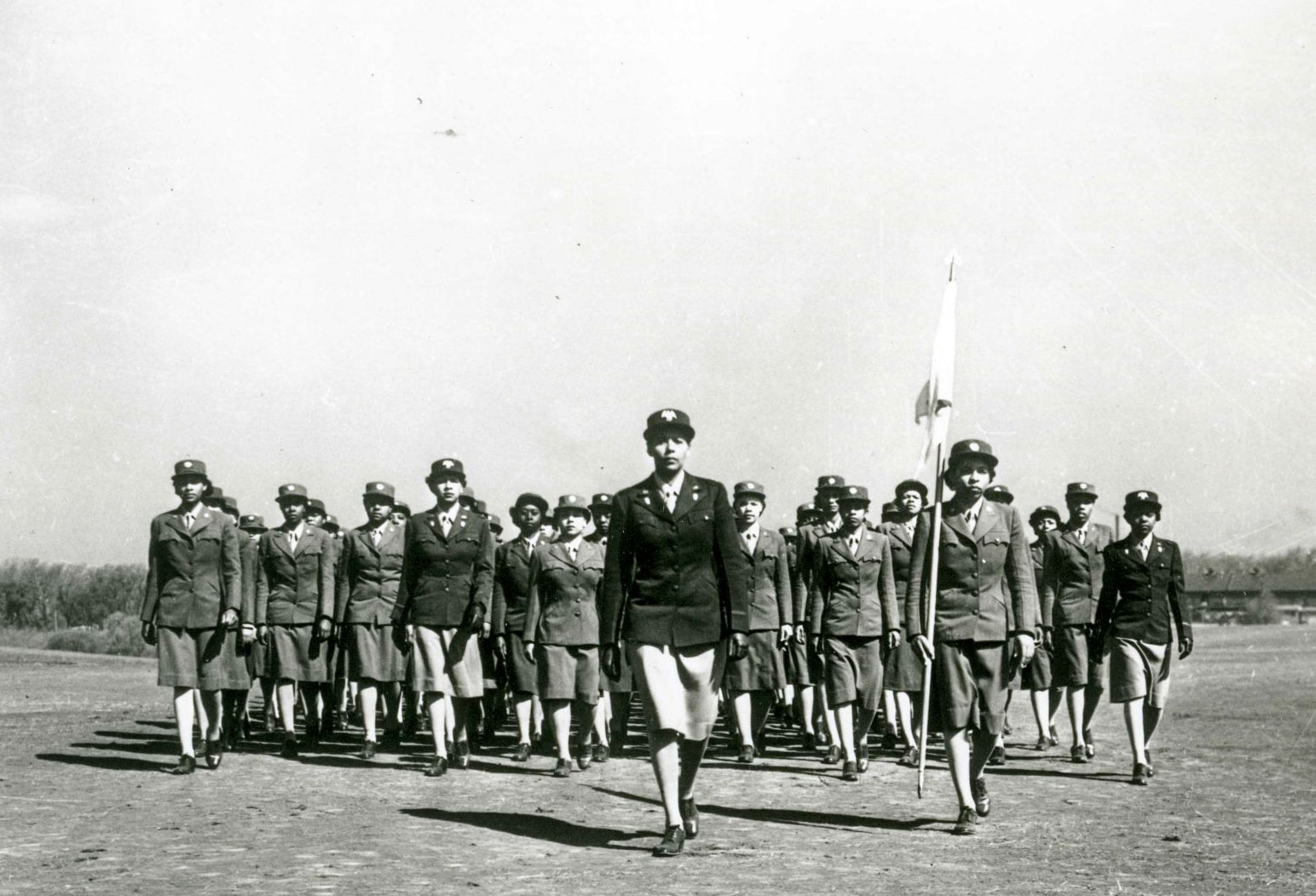 Soldiers of the 6888th marching in formation. Photo by anonymous (c. 1945). PD-U.S. Government.