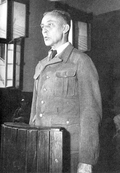 Defendant Jürgen Stroop in the witness box during his trial. Photo by anonymous (July 1951). PD-Poland. Wikimedia Commons.