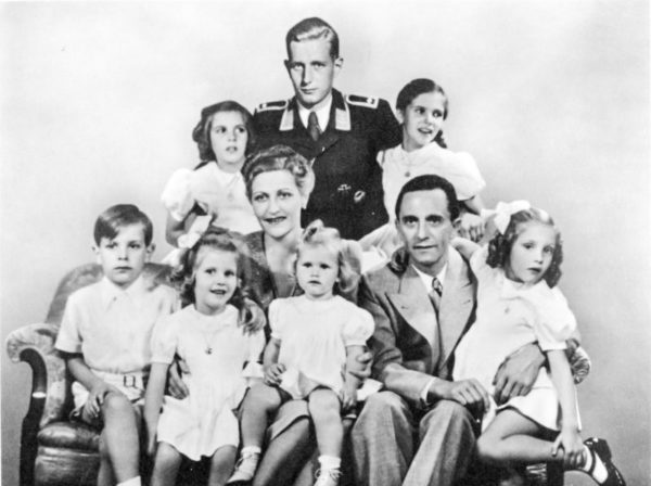 Joseph and Magda Goebbels and family. Harald Quandt, upper center, is in his Luftwaffe uniform. Photo by anonymous (January 1944). German Federal Archives. PD-Bundesarchiv, Bild 146-1978-086-03/CC-BY-SA 3.0. Wikimedia Commons.
