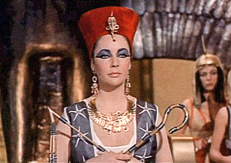 Elizabeth Taylor from a trailer for the 1963 film “Cleopatra.” Photo by Twentieth Century Fox (1963). PD-Expired Copyright. Wikimedia Commons.