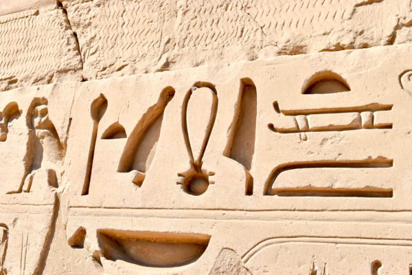 Hieroglyphics at Karnak Temple. Example of deep cuts ordered by Ramses II. Photo by Sandy Ross (2019).