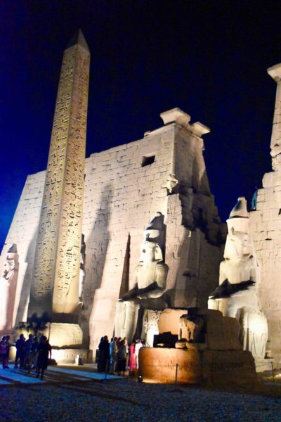 Entrance to Luxor Temple. The twin Luxor Obelisk with the remaining pedestal. Photo by Sandy Ross (2019).