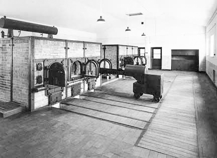 Buchenwald’s crematorium with elevator in right hand corner. This rooms sits above the execution chamber where the bodies were loaded onto the hand operated elevator (background on the right) and brought up to the crematorium. Photo by anonymous (c. 1945). Posted in www.scrapebookpages.com