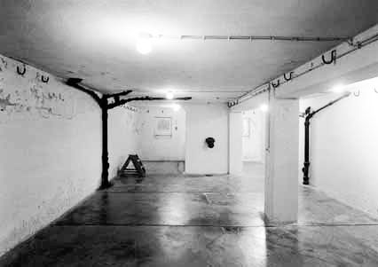 Buchenwald’s execution room. Notice the meat hooks on the walls. Photo by anonymous (c. 1945). Posted in www.scrapebookpages.com