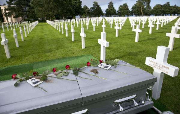 The casket of U.S. Navy sailor Julius Pieper lays next to the grave of his twin brother. Photo by anonymous (19 June 2018).