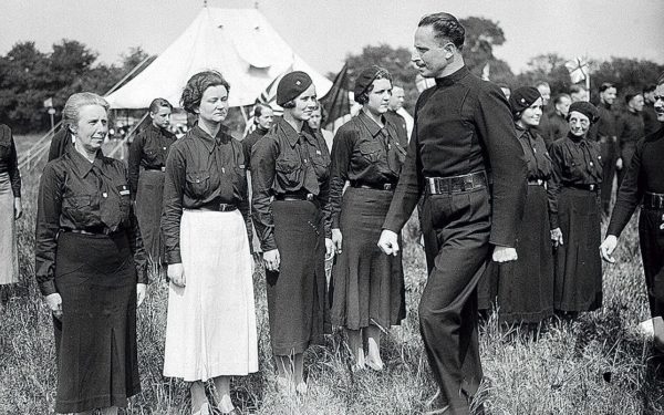 Sir Oswald Mosley reviewing BUF members at a rally in 1930s. Photo by anonymous (c. 1930s). Getty Images.