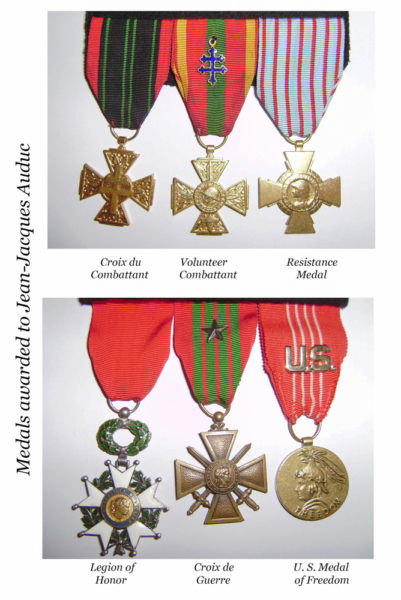 Medals awarded to Jean-Jacques Auduc, the youngest French résistant. From upper right and clockwise: Croix du Combattant, Volunteer Combattant, Resistance Medal, Legion of Honor, Croix de Guerre, and the U.S. Medal of Freedom. Photo by anonymous (date unknown). Courtesy of Ken Kirk.