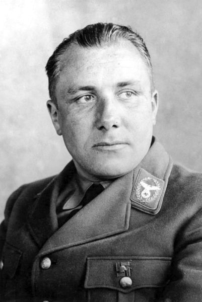 Reichsleiter Martin Bormann. Photo by anonymous (c. 1934). Bundesarchiv, Bild 183-R14128A/CCA-BY-SA 3.0. PD-CCA-Share Alike 3.0 Germany. Wikimedia Commons.