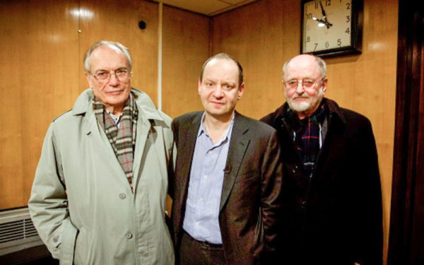 Still photo associated with the documentary, “What Our Fathers Did: A Nazi Legacy.” Horst von Wächter (left; son of Otto von Wächter) and Niklas Frank (right). Von Wächter has not disavowed his father’s actions while Niklas Frank has. Philippe Sands, international lawyer, stands between them. His family perished in Nazi-occupied Poland under Hans Frank and Otto von Wächter. Photo by anonymous (c. 2015). 