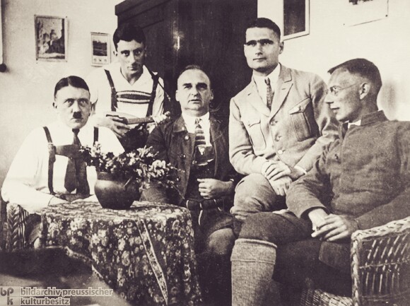 Nazi leaders who participated in the Beer Hall Putsch: Adolf Hitler (left), Emil Maurice (second from left), Hermann Kriebel (center), Rudolf Hess (second from right), and Friedrich Weber (far right). Photo taken inside Landsberg prison. Photo by anonymous (c. 1924). Bildarchive Preussischer Kulturbesitz. PD-70+. Wikimedia Commons.