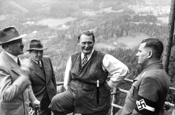 Adolf Hitler (left), Martin Bormann (second from left), Hermann Göring (second from right), and Baldur von Schirach (far right) at Obersalzberg. Photo by anonymous (c. 1936). Bundesarchiv B 145 Bild-F051620-0043/CCA-BY-SA 3.0. PD-CCA-Share Alike 3.0 Germany. Wikimedia Commons.