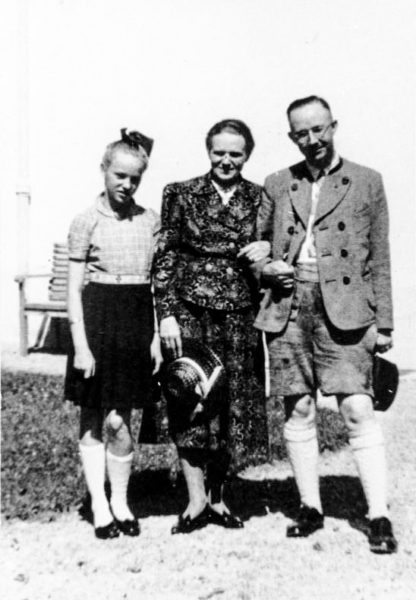 Himmler family: Gudrun (left), Marga (center), and Heinrich Himmler (right). Photo by anonymous (date unknown). German Federal Archives. Bundesarchiv, Bild 146-1969-056-55/CC-BY-SA 3.0. PD-CCA-Share Alike 3.0 Germany. Wikimedia Commons.