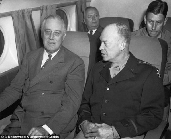 Roosevelt and General Eisenhower in route by air to Tehran. Photo by anonymous (c. November 1943). ©️ Underwood & Underwood Corbis.