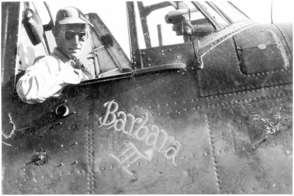 Lt. Bush in the cockpit of the “Barbara III.” Photo by anonymous (date unknown).