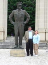 Stew and Sandy next to Ike’s statue in Normandy. Photo by Jacques 2007.