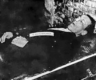 The body of Ernst Kaltenbrunner after being hanged. Photo by anonymous (16 October 1946). PD-U.S. Government. Wikimedia Commons.